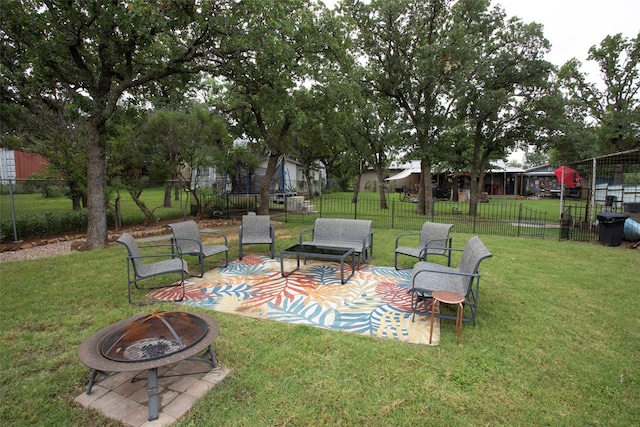 10234 County Road 198, Breckenridge, TX 76424 - view of yard with an outdoor fire pit and a patio