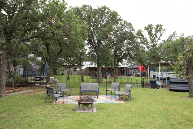 10234 County Road 198, Breckenridge, TX 76424 - view of yard featuring an outdoor fire pit