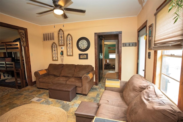 10234 County Road 198, Breckenridge, TX 76424 - living room with ceiling fan and crown molding