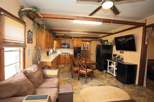 10234 County Road 198, Breckenridge, TX 76424 - kitchen featuring black appliances, brown cabinets, light countertops, a ceiling fan, and stone finish flooring