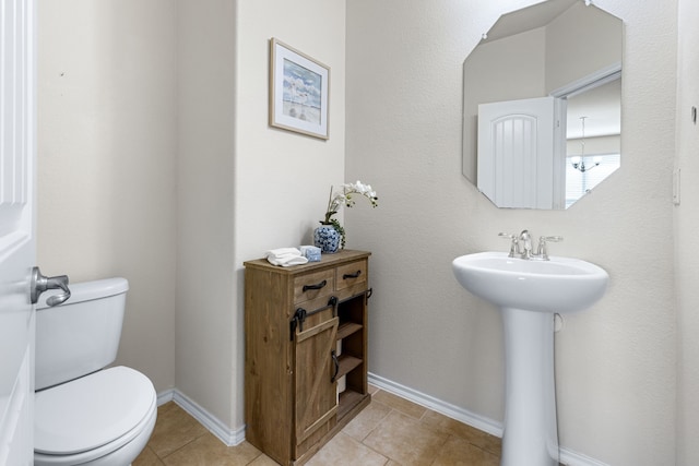 584 Indian Hill Dr, Oak Point, TX 75068 - half bath with toilet and tile patterned floors