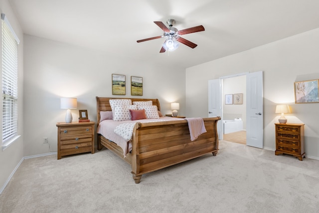 584 Indian Hill Dr, Oak Point, TX 75068 - carpeted bedroom with a ceiling fan and connected bathroom