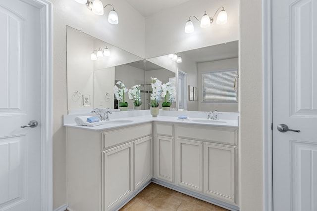 584 Indian Hill Dr, Oak Point, TX 75068 - bathroom featuring double vanity and tile patterned flooring