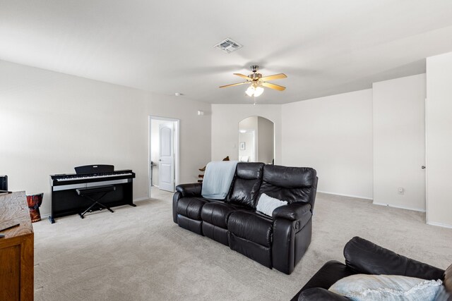 584 Indian Hill Dr, Oak Point, TX 75068 - living area featuring arched walkways, light carpet, and a ceiling fan