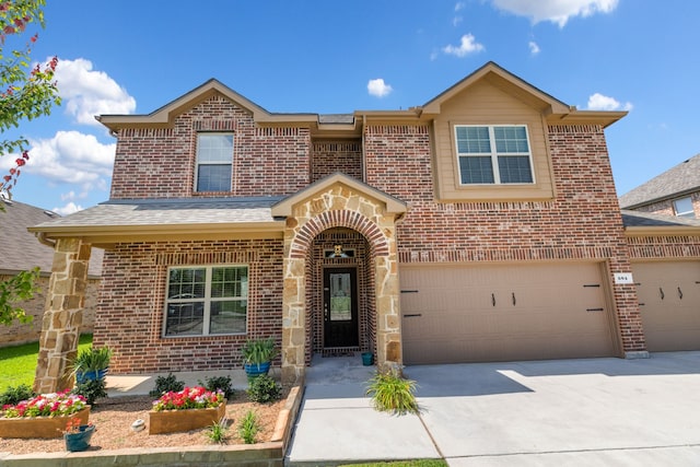 584 Indian Hill Dr, Oak Point, TX 75068 - traditional home featuring brick siding, driveway, and an attached garage