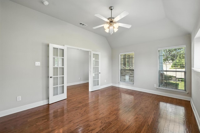 8120 Tyler Dr, Lantana, TX 76226 - empty room with french doors, lofted ceiling, wood finished floors, a ceiling fan, and a smoke detector