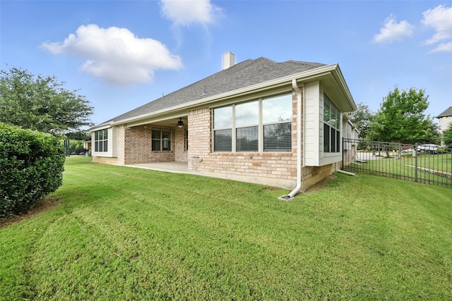 8120 Tyler Dr, Lantana, TX 76226 - rear view of house with a ceiling fan, a patio, brick siding, and a chimney