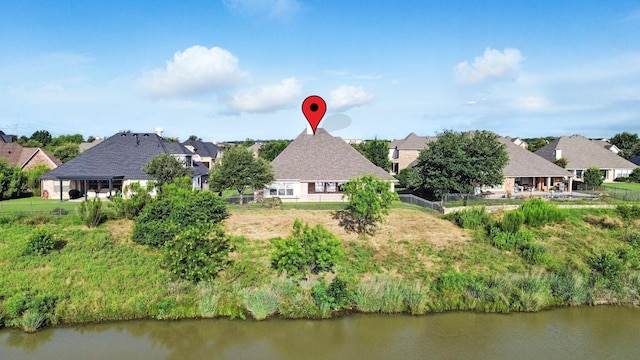 8120 Tyler Dr, Lantana, TX 76226 - aerial perspective of suburban area with a nearby body of water