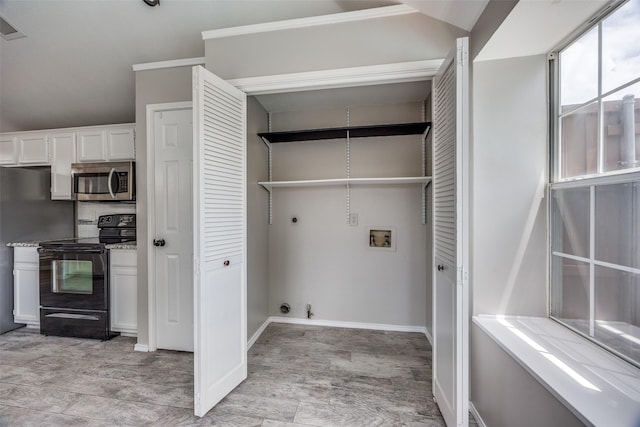 2102 Overview Ln, Garland, TX 75044 - laundry area featuring hookup for a gas dryer, hookup for a washing machine, and electric dryer hookup