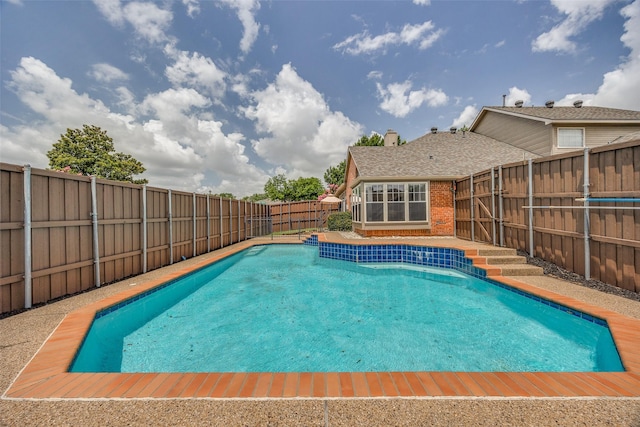 2102 Overview Ln, Garland, TX 75044 - view of swimming pool featuring a fenced backyard