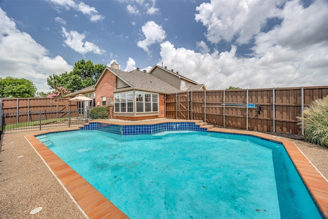 2102 Overview Ln, Garland, TX 75044 - view of swimming pool featuring a fenced backyard