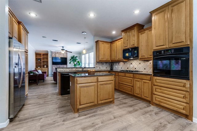 17712 Meadow Grove Ln, Dallas, TX 75287 - kitchen featuring black appliances, open floor plan, ceiling fan, light wood finished floors, and recessed lighting