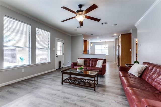 17712 Meadow Grove Ln, Dallas, TX 75287 - living area featuring crown molding, ceiling fan, healthy amount of natural light, light wood finished floors, and recessed lighting