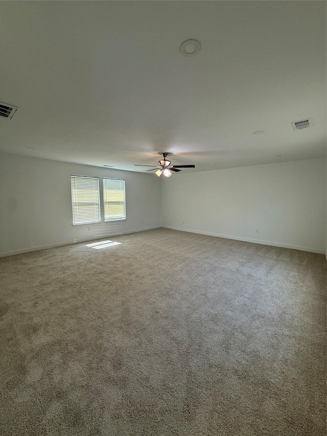 1019 E Waco Ave, Dallas, TX 75216 - carpeted spare room with a ceiling fan and baseboards