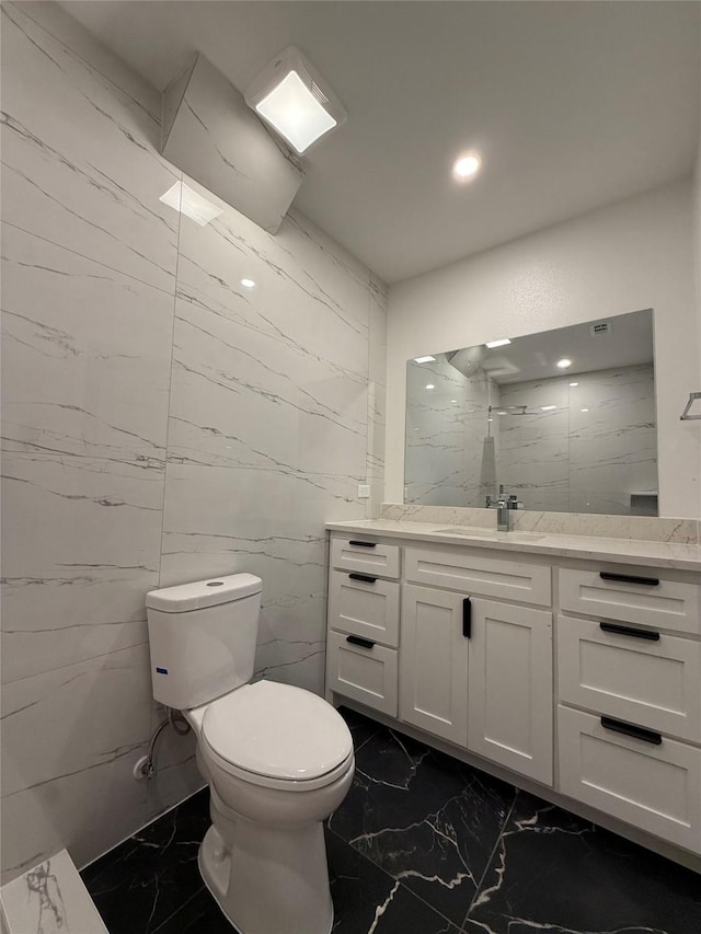 1019 E Waco Ave, Dallas, TX 75216 - full bathroom with marble finish flooring, vanity, and recessed lighting