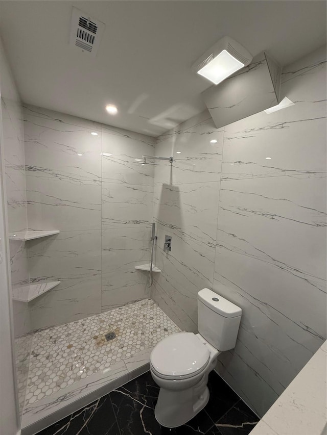 1019 E Waco Ave, Dallas, TX 75216 - bathroom with marble finish floors, a marble finish shower, and recessed lighting