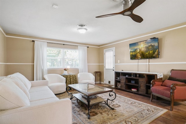 5428 Sabelle Ln, Haltom City, TX 76117 - living room with ornamental molding, wood finished floors, and ceiling fan
