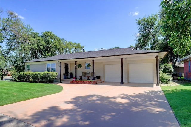 5428 Sabelle Ln, Haltom City, TX 76117 - ranch-style home featuring brick siding, a front yard, concrete driveway, and an attached garage