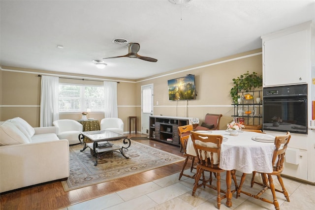 5428 Sabelle Ln, Haltom City, TX 76117 - dining space with ceiling fan and crown molding