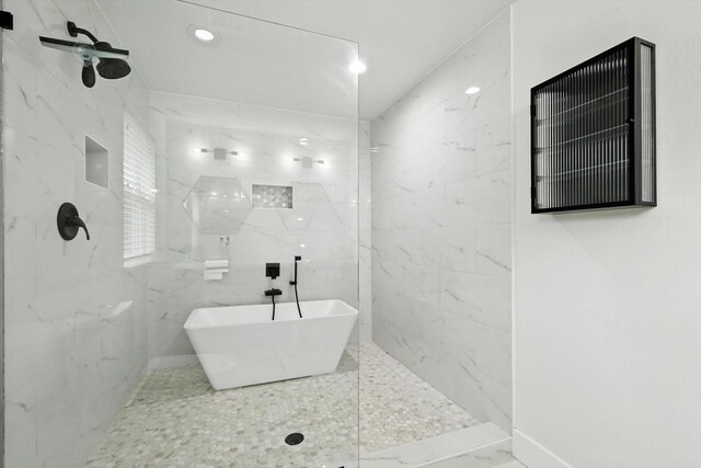 1415 W St, Mckinney, TX 75069 - bathroom with a marble finish shower, marble finish flooring, and recessed lighting