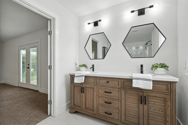1415 W St, Mckinney, TX 75069 - bathroom with double vanity and baseboards
