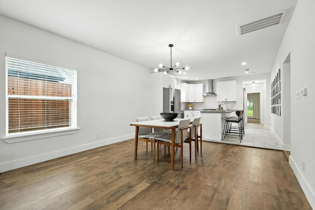 1415 W St, Mckinney, TX 75069 - dining area featuring a chandelier, plenty of natural light, hardwood / wood-style floors, and recessed lighting