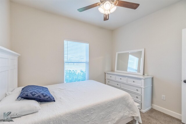 7309 Wildflower Way, Abilene, TX 79602 - bedroom with light colored carpet and a ceiling fan