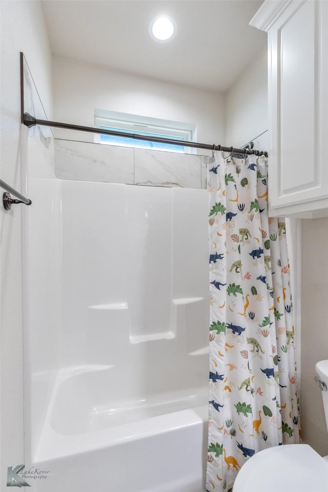 7309 Wildflower Way, Abilene, TX 79602 - bathroom featuring toilet and shower / bath combo with shower curtain