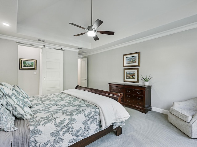 13002 Terlingua Creek Dr, Frisco, TX 75033 - carpeted bedroom with a barn door, a tray ceiling, ornamental molding, recessed lighting, and ceiling fan