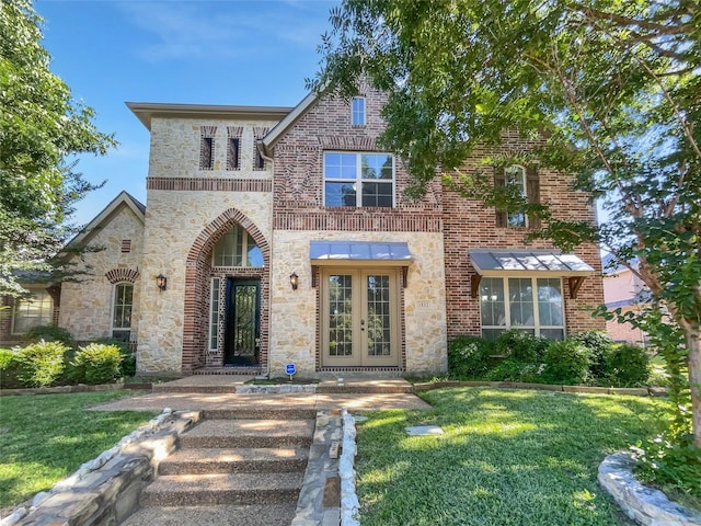 1832 Olney Dr, Allen, TX 75013 - view of front of home with a front lawn, stone siding, and brick siding