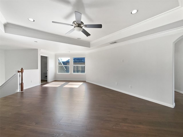 1832 Olney Dr, Allen, TX 75013 - spare room with a raised ceiling, crown molding, recessed lighting, dark wood-style flooring, and arched walkways