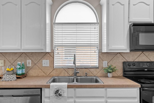 60 N Highland Dr, Sanger, TX 76266 - kitchen with black appliances, white cabinets, and light countertops