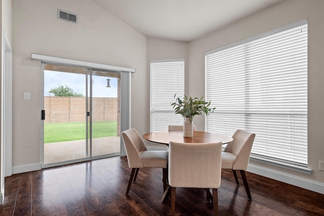 60 N Highland Dr, Sanger, TX 76266 - dining space featuring vaulted ceiling and dark wood finished floors