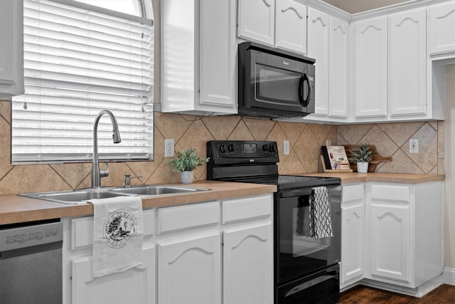60 N Highland Dr, Sanger, TX 76266 - kitchen with black appliances, white cabinets, tasteful backsplash, light countertops, and plenty of natural light