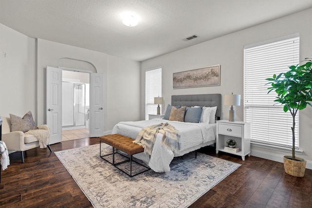 60 N Highland Dr, Sanger, TX 76266 - bedroom featuring dark wood-style floors and baseboards