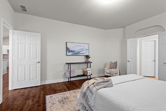 60 N Highland Dr, Sanger, TX 76266 - bedroom featuring wood finished floors and baseboards