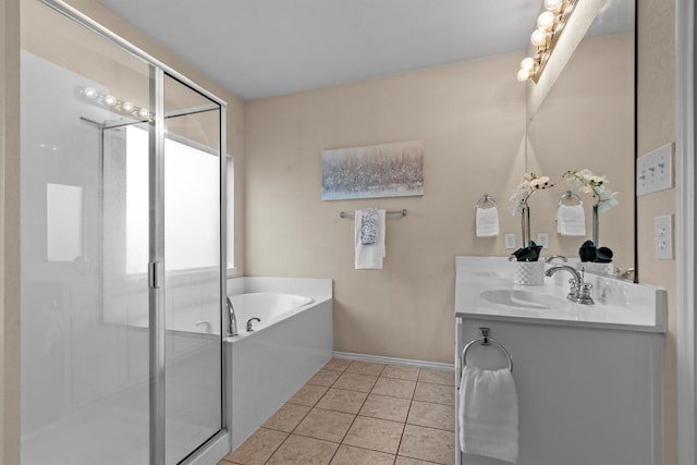 60 N Highland Dr, Sanger, TX 76266 - bathroom featuring double vanity, a bath, tile patterned flooring, and a stall shower