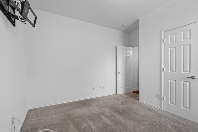 60 N Highland Dr, Sanger, TX 76266 - unfurnished bedroom with carpet flooring and baseboards