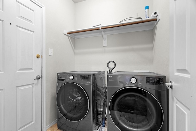 60 N Highland Dr, Sanger, TX 76266 - laundry room with washer and clothes dryer