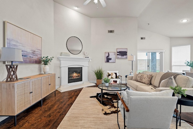 60 N Highland Dr, Sanger, TX 76266 - living area featuring a ceiling fan, a glass covered fireplace, dark wood-style floors, high vaulted ceiling, and recessed lighting