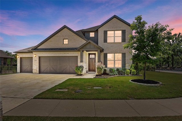216 Shadow Creek Ln, Hickory Creek, TX 75065 - view of front of property featuring a garage, driveway, a front yard, brick siding, and stone siding