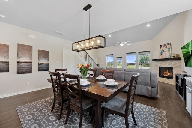 216 Shadow Creek Ln, Hickory Creek, TX 75065 - dining area featuring dark wood finished floors, stairway, a fireplace, recessed lighting, and a ceiling fan