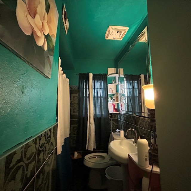 4028 Forbes St, Fort Worth, TX 76105 - bathroom featuring a sink and toilet