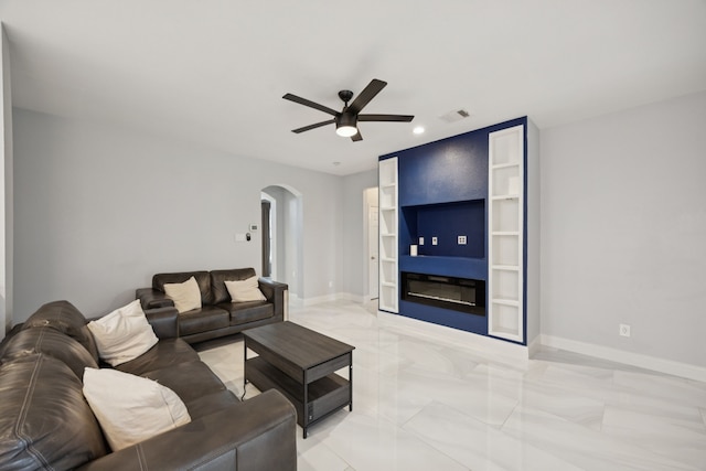 433 Willow Bend Dr, Murphy, TX 75094 - living room featuring arched walkways, ceiling fan, and recessed lighting