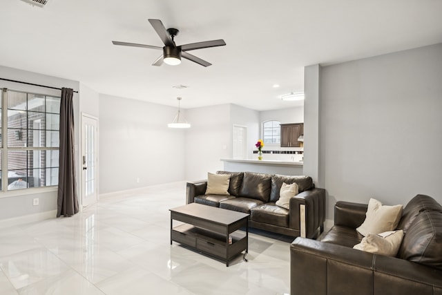 433 Willow Bend Dr, Murphy, TX 75094 - living room with ceiling fan and baseboards