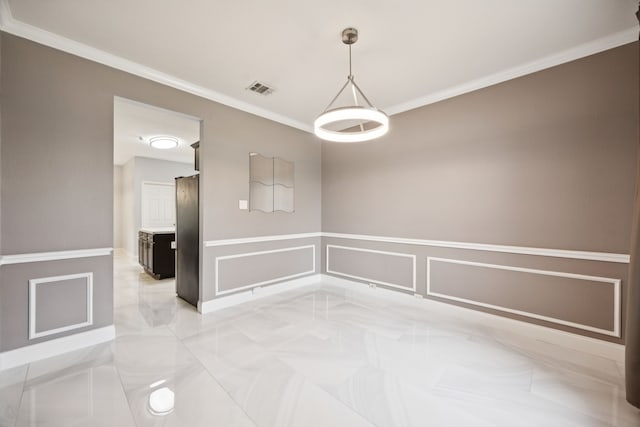 433 Willow Bend Dr, Murphy, TX 75094 - spare room featuring crown molding, wainscoting, and a decorative wall