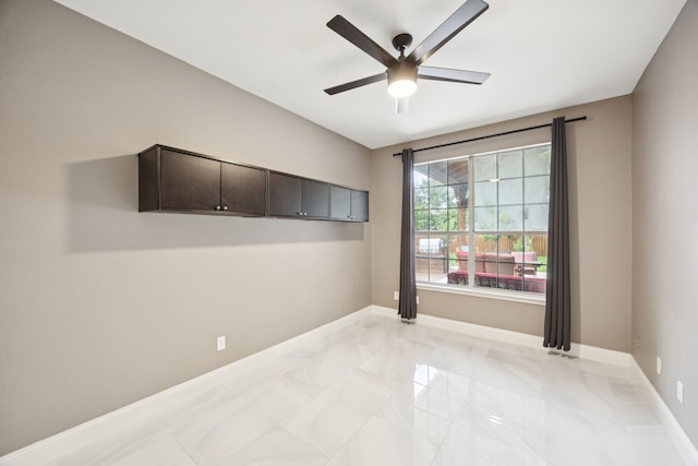 433 Willow Bend Dr, Murphy, TX 75094 - empty room featuring ceiling fan and light marble finish floors