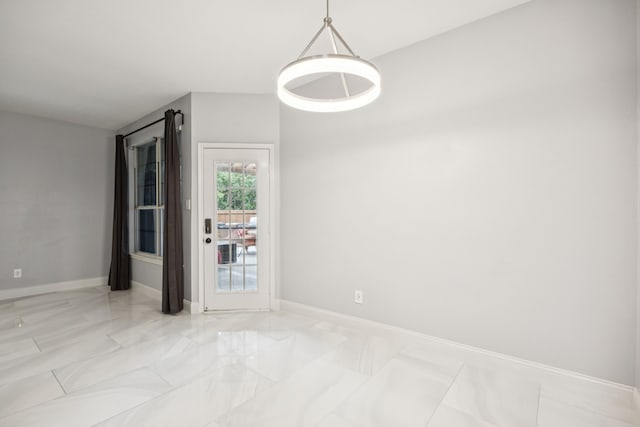 433 Willow Bend Dr, Murphy, TX 75094 - unfurnished room featuring baseboards and marble finish floors