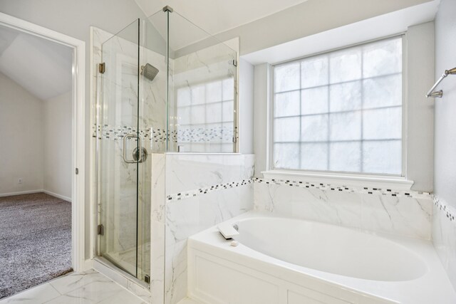 433 Willow Bend Dr, Murphy, TX 75094 - bathroom featuring a bath, a marble finish shower, vaulted ceiling, and marble finish floors