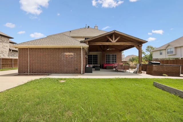 433 Willow Bend Dr, Murphy, TX 75094 - rear view of house featuring ceiling fan, outdoor lounge area, brick siding, roof with shingles, and a patio area